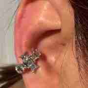 Stylish touch with this cross ear cuff